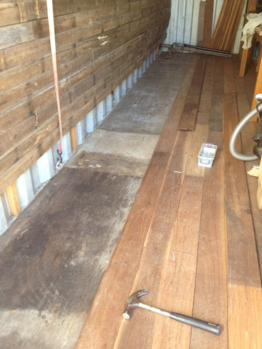 Hardwood flooring to cover the ply bedroom container floor