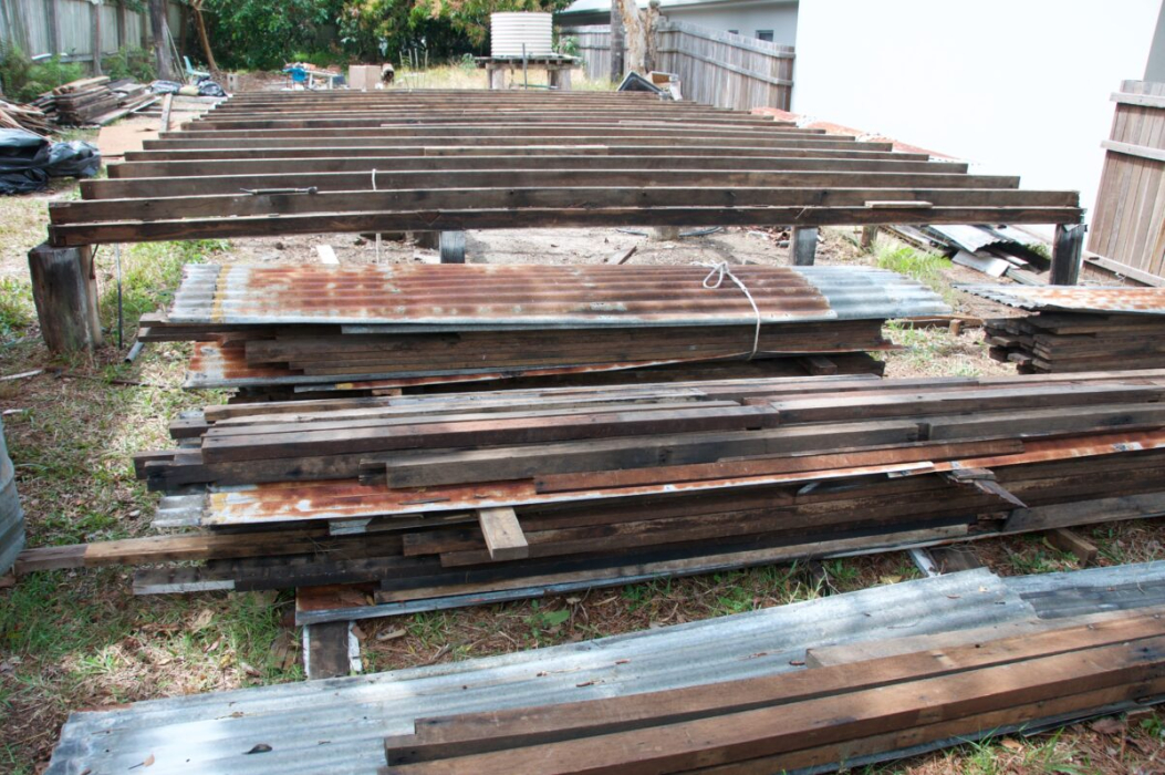 Stacks of salvaged timbers